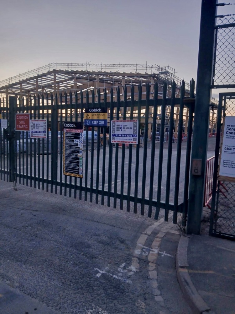 Caddick Construction site gates with DMS security signage