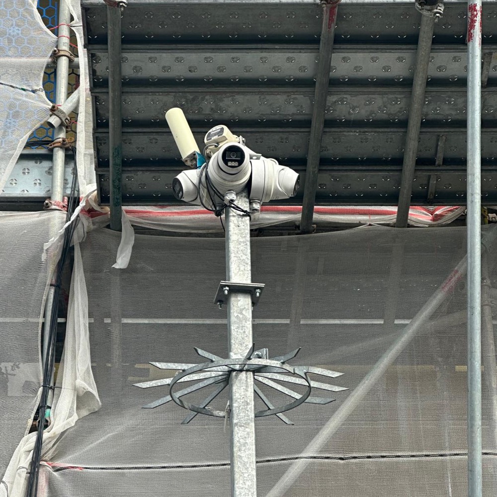 DMS CCTV camera mounted on a pole inside site scaffolding