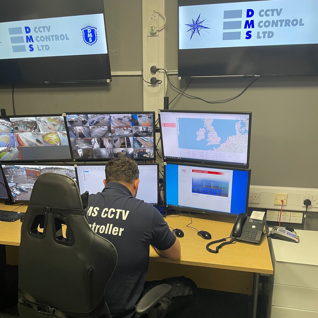 DMS CCTV controller watching camera feeds in the control station