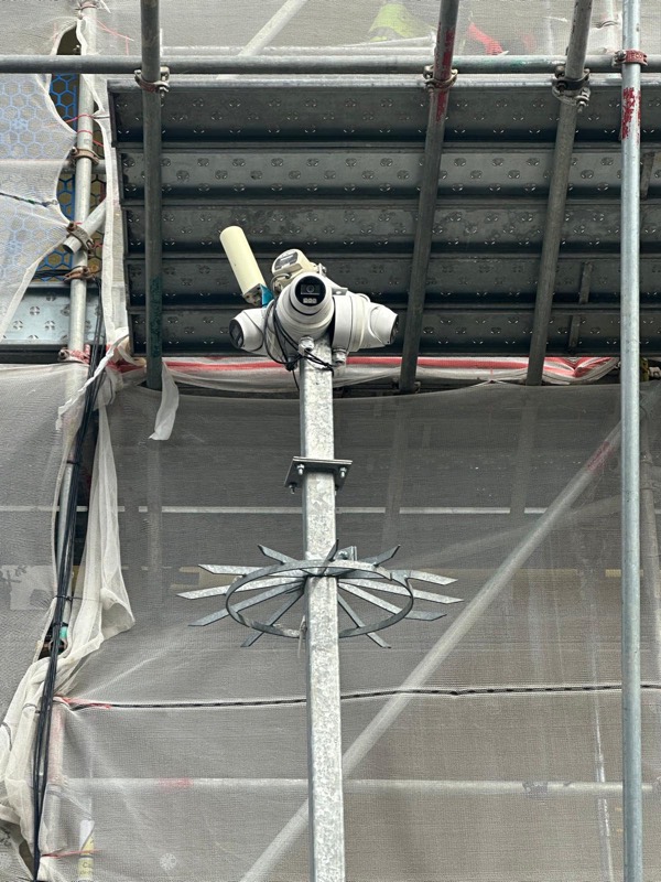 DMS CCTV camera installed on a pole inside site scaffolding