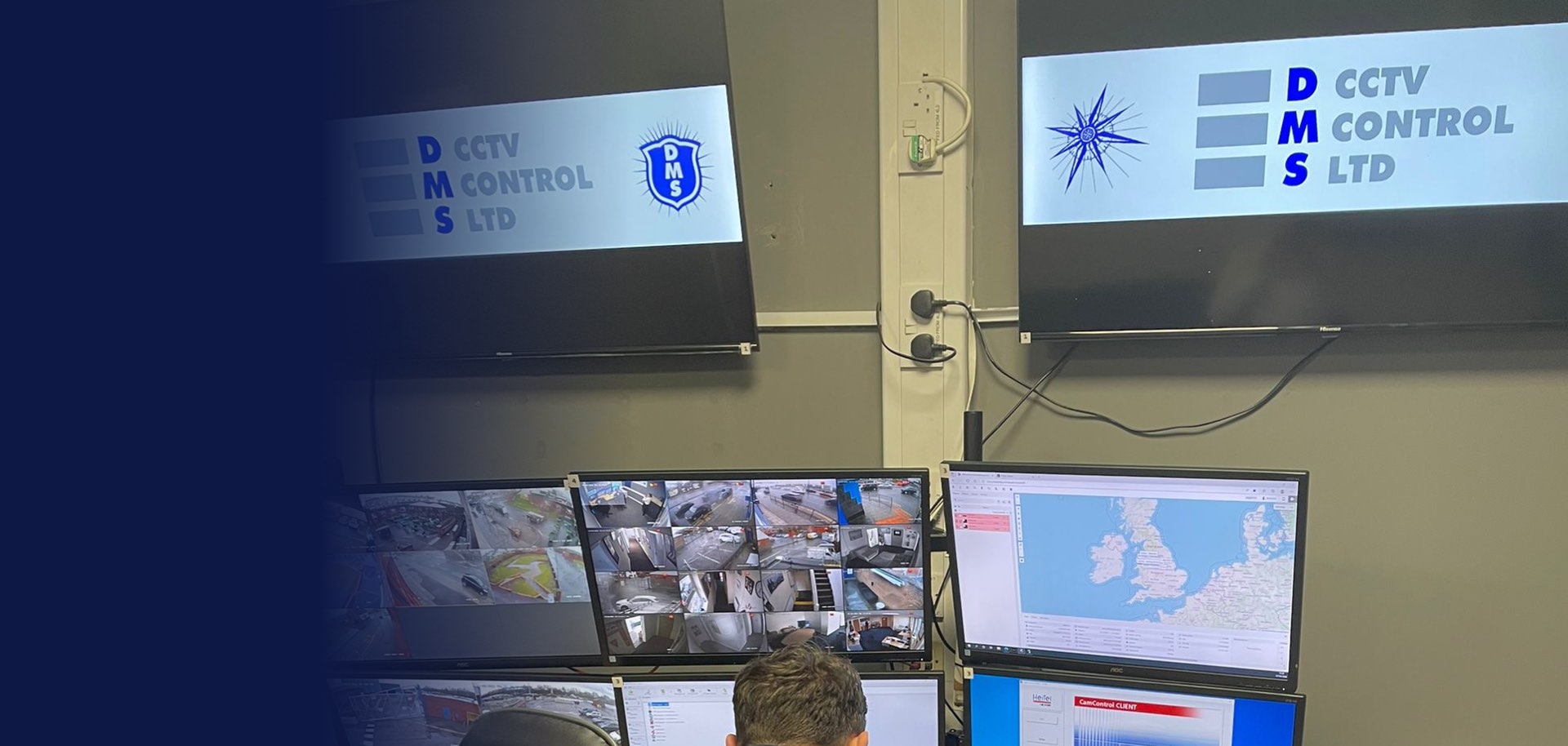 DMS controller monitoring camera feeds in the 24/7 control station