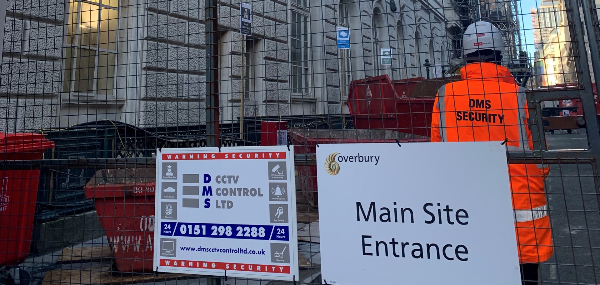 DMS security officer and DMS signage at the India Buildings site entrance
