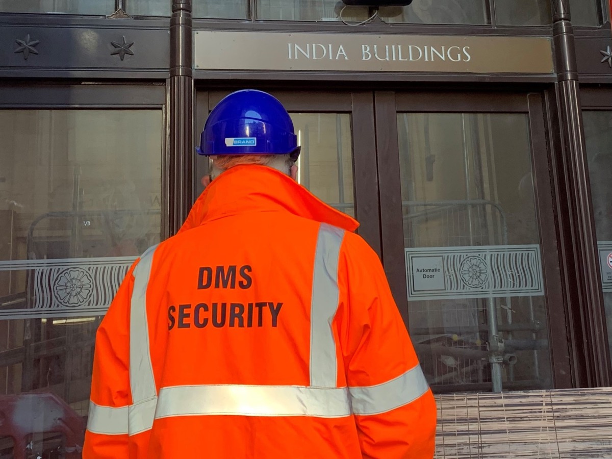 DMS security officer outside India Buildings, Liverpool
