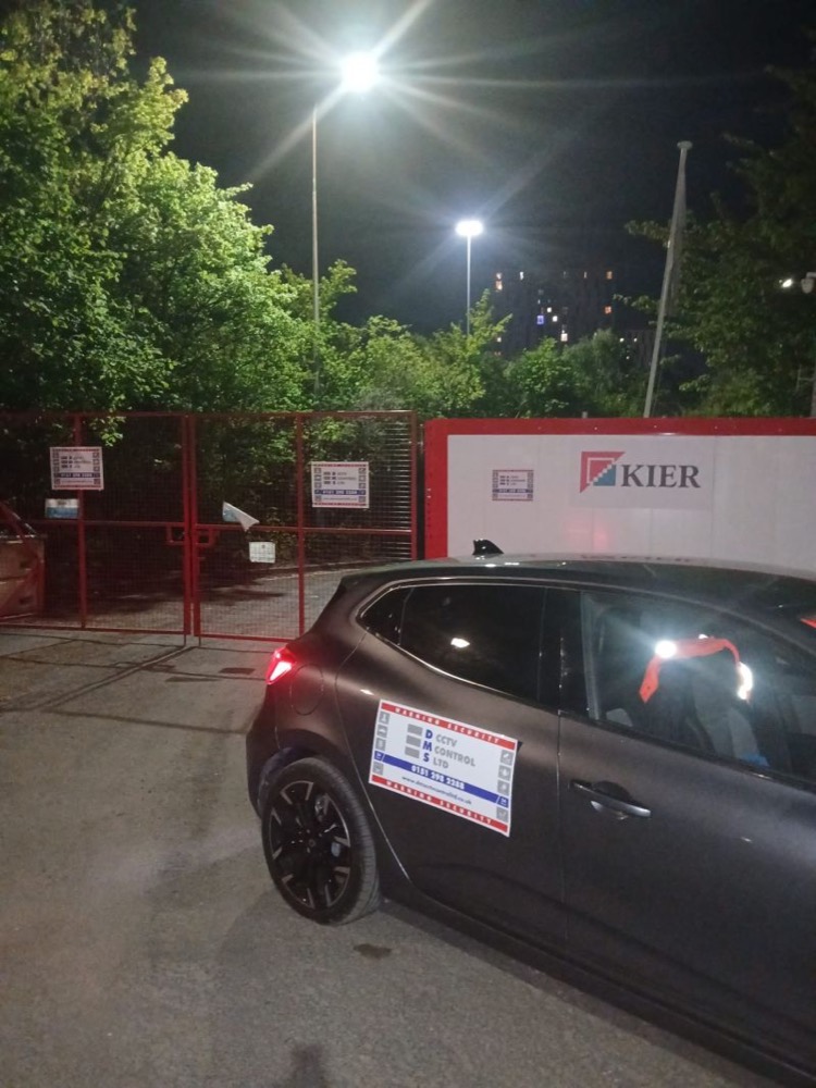 DMS patrol car at a Kier site at night